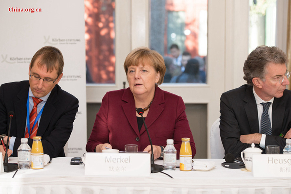 German Chancellor Angela Merkel delivers a keynote speech to the 160th Bergedorf Round Table at the former residence of Soong Ching Ling (Madame Dr. Sun Yat-sen) in Beijing on Oct. 29. [Photo by Chen Boyuan / China.org.cn]